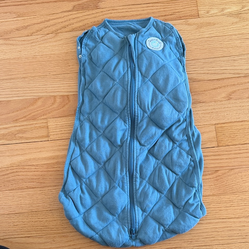 Dreamland baby sleep sack with internal swaddle band in powder blue